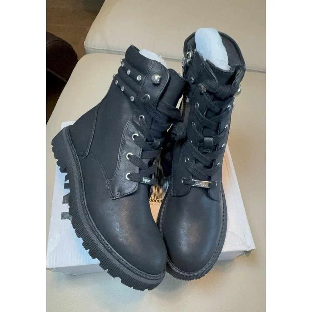 Youth girls size 5 DKNY black boots.